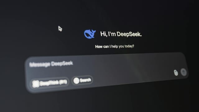 A detailed view of the DeepSeek AI interface, displaying a welcoming message on a dark background.