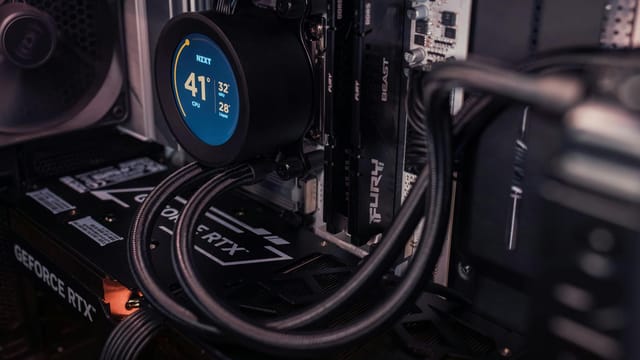 Internal view of a gaming PC showcasing advanced cooling and graphics capability.