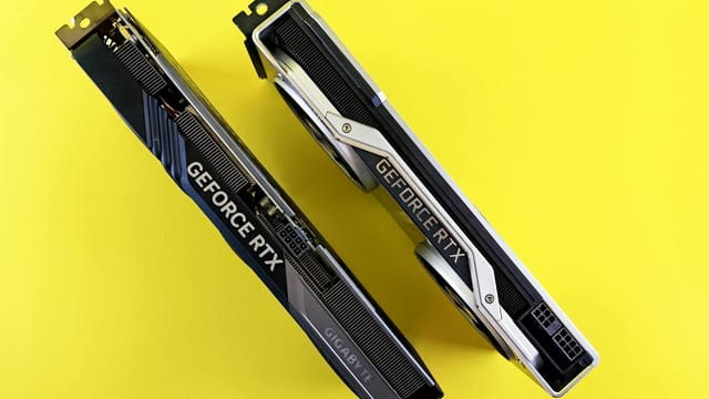 Top view of dual GeForce RTX graphics cards set against a bright yellow background, emphasizing modern technology.