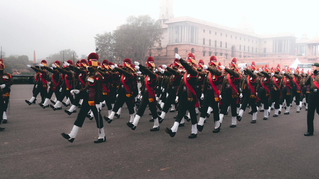 Indian soldiers in ceremonial uniform march during a Republic Day parade.