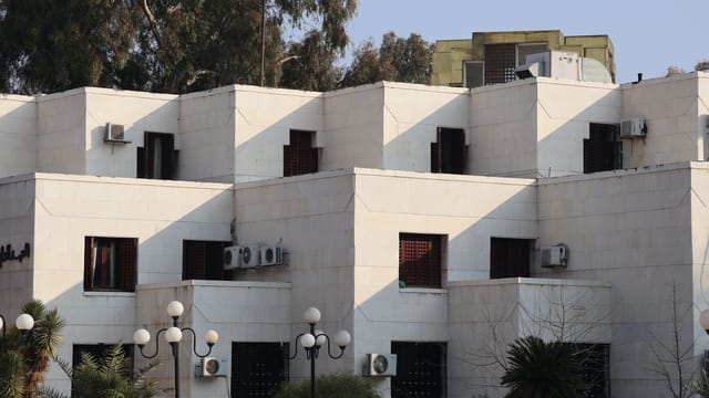 Modern building with geometric design in Damascus, Syria showcasing urban architecture.
