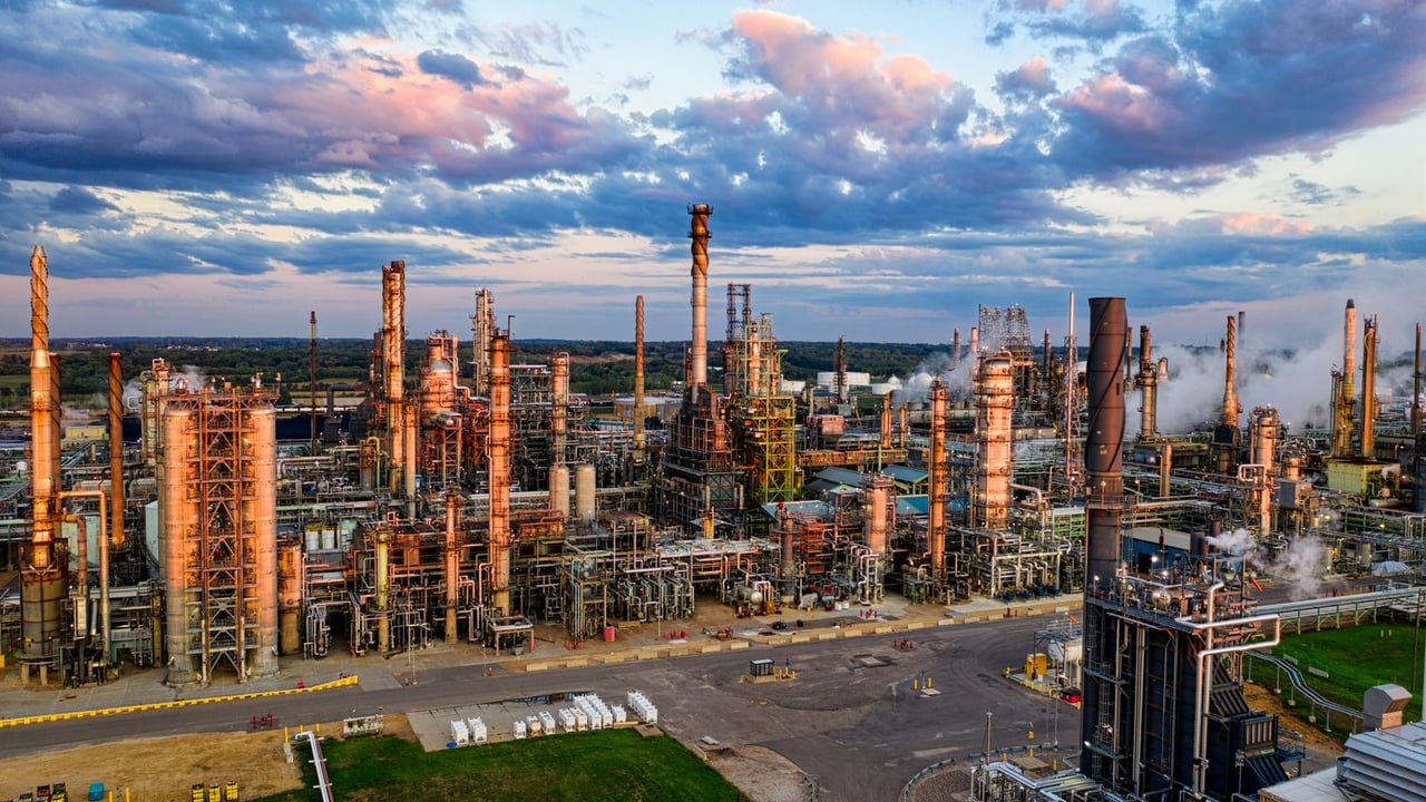 Stunning aerial shot of an oil refinery in Rosemount, MN, showcasing industrial complexity at sunset.