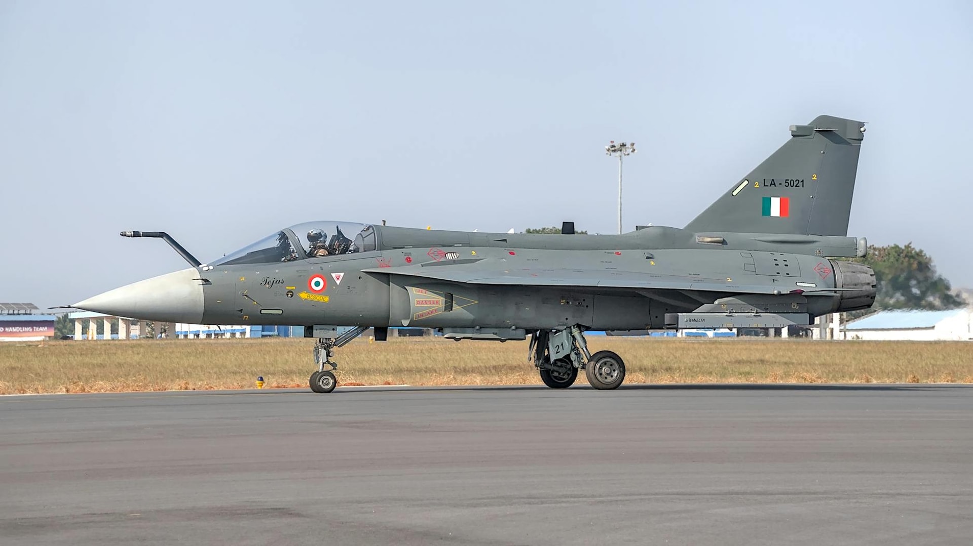 Tejas fighter jet of Indian Air Force parked on runway in Bengaluru, India.