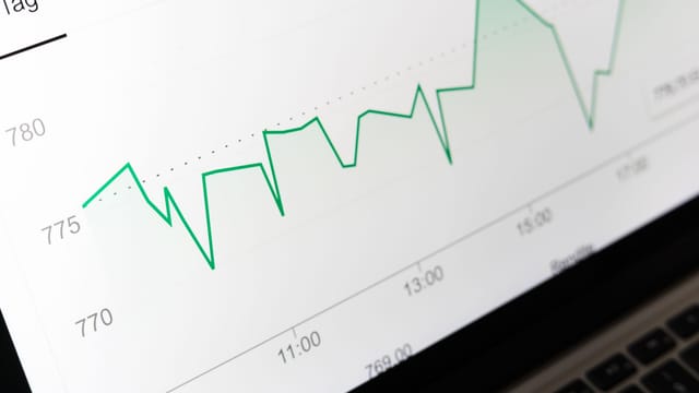 Detailed close-up of a financial graph on a computer screen showing data trends.