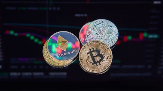 Floating Bitcoin and Ethereum coins with a market trend chart in the background symbolizing digital finance.