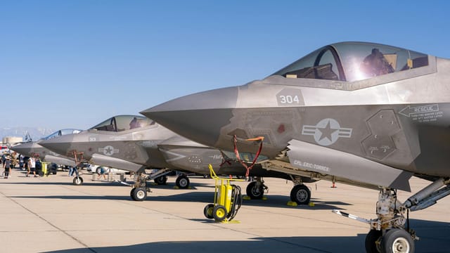 Close-up view of F-35 fighter jets aligned on March Air Reserve Base runway.