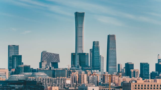 Explore the stunning skyline of Beijing with the iconic China Zun tower rising prominently.