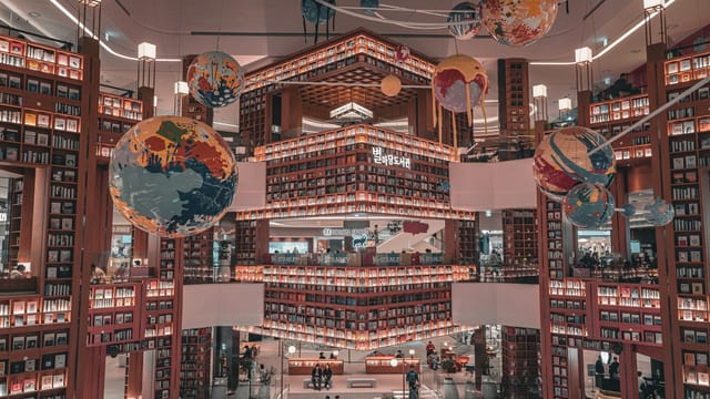 Explore the stunning architecture and vibrant atmosphere of Starfield Library in Seoul, South Korea.