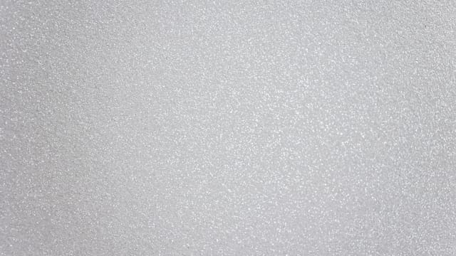 Abstract textured background representing light gray surface with many tiny drops of water