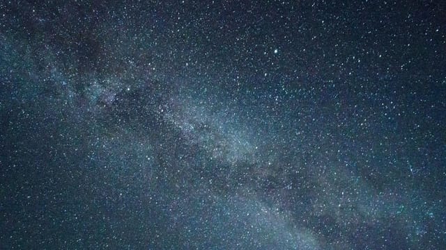 A stunning view of the starry night sky featuring the Milky Way galaxy.