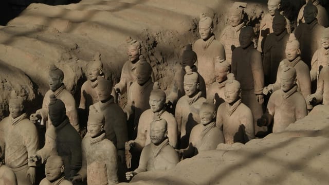 High-angle view of the terracotta army in Xi'an, China, a UNESCO World Heritage site.