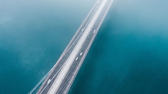 A stunning aerial photo of a bridge spanning the Bosphorus Strait in Istanbul, Turkey.