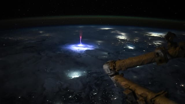 Gigantic jet photographed by Nichole Ayers on the International Space Station, some edits