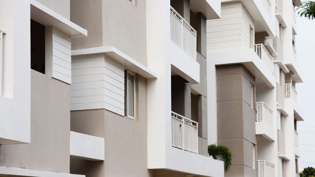 A modern apartment building exterior with balconies in Hyderabad, India.