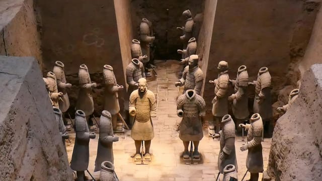 Terracotta Army sculptures in Xi'an, depicting ancient Chinese soldiers guarding the tomb.