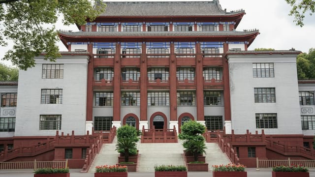 Front view of a traditional building at Sichuan University in Chengdu, showcasing distinct architectural features.