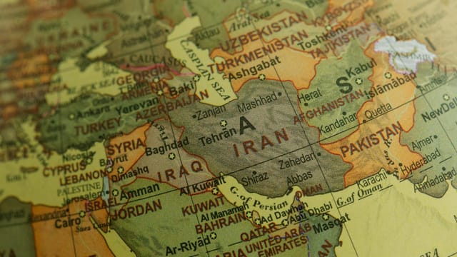 Close-up view of Middle East map highlighting countries and borders.