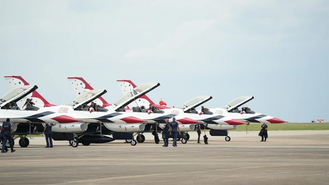 A lineup of US Air Force Thunderbirds preparing for an airshow in Hampton, Virginia.