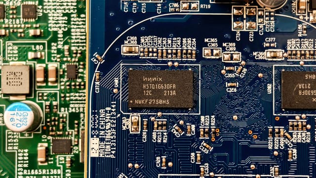 Detailed close-up of computer circuit boards highlighting electronic components and intricate circuitry.