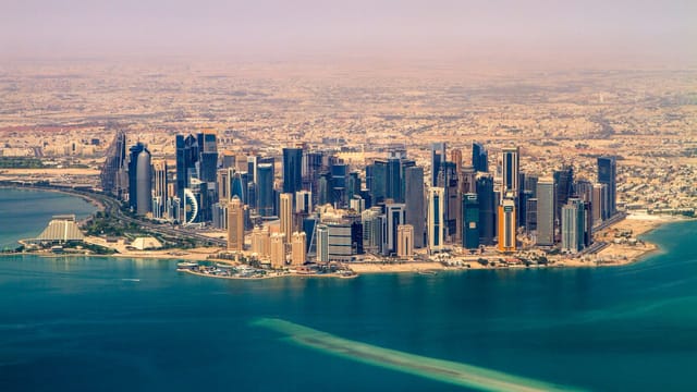 Stunning aerial view of Doha's modern skyline and waterfront, Qatar.