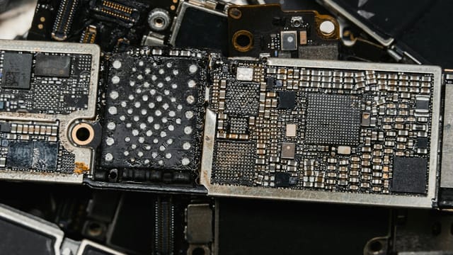 Detailed image of electronic circuit board components, showcasing intricate engineering.