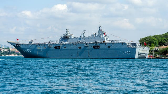 The TCG Anadolu L400 military ship navigating the waters of Istanbul, Turkey.