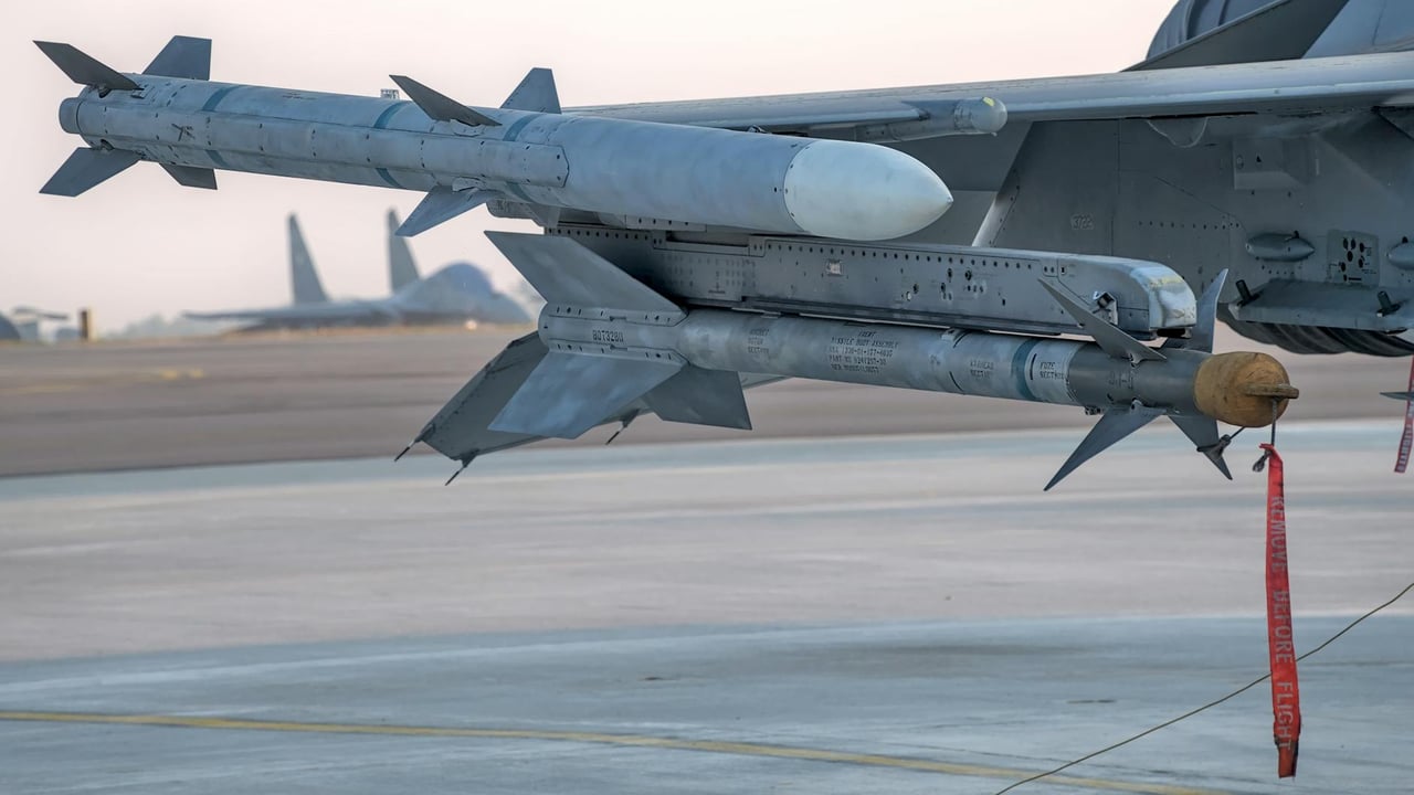 Detailed view of a military missile mounted on an aircraft wing at an airbase in Bengaluru.