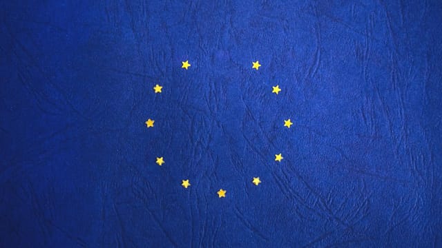 European Union flag with missing stars representing Brexit concept.