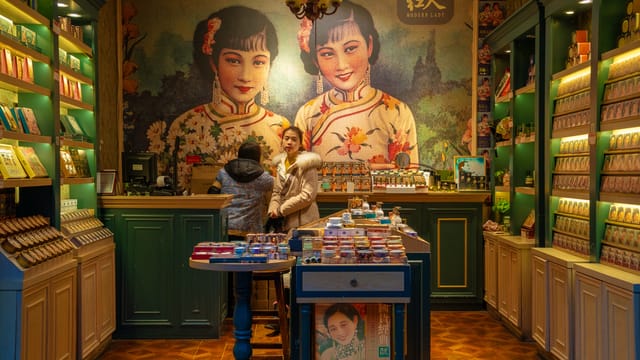 Elegant shop interior in Chengdu featuring vintage decor and vibrant colors. Customers browsing products.