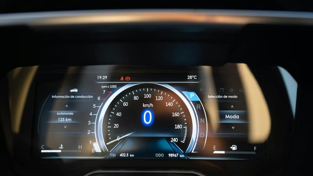 Close-up of a digital car dashboard in Buenos Aires, displaying a speedometer reading of zero km/h.