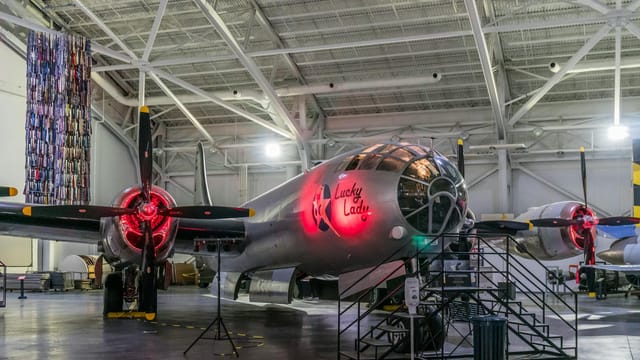 Boeing B-50 Lucky Lady on display in a well-lit aircraft museum hangar.