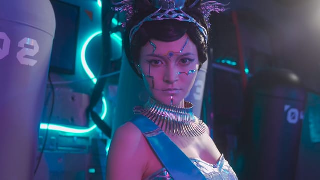 A woman with sci-fi makeup and armor in a vibrant, neon-lit environment.