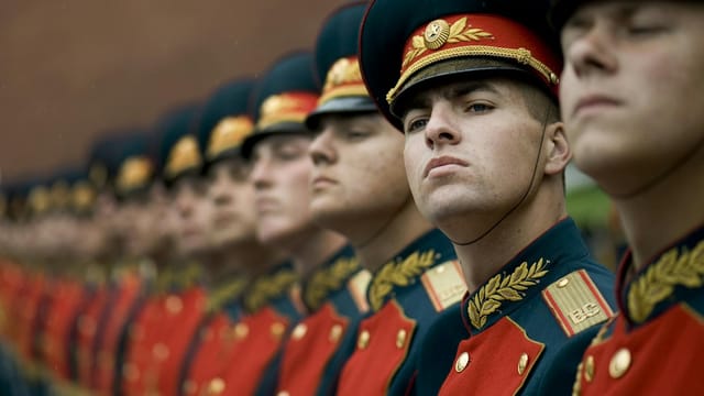 Close-up of Russian soldiers in ceremonial uniforms participating in a parade formation.