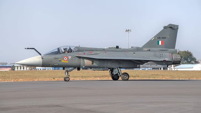 Tejas fighter jet of Indian Air Force parked on runway in Bengaluru, India.