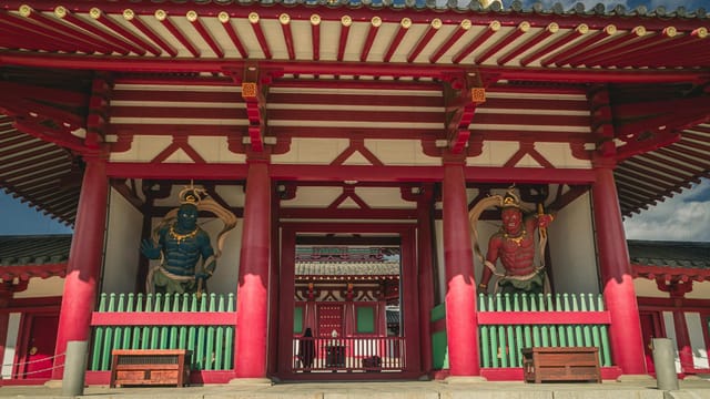 Colorful gate at Shitennoji Temple, Osaka, showcasing traditional architecture.