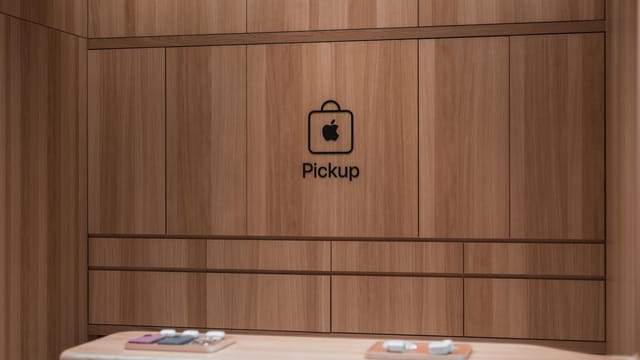 Modern Apple store pickup counter featuring a sleek wooden interior design