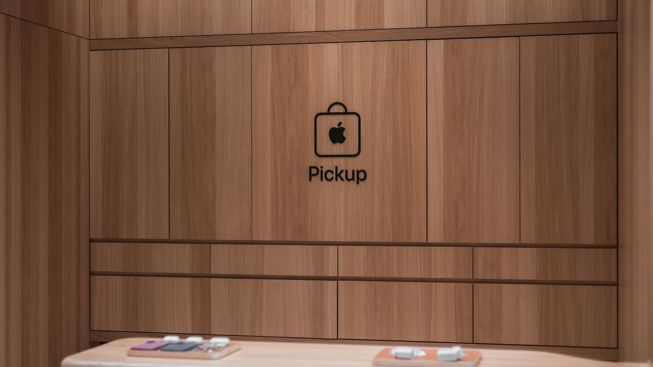 Modern Apple store pickup counter featuring a sleek wooden interior design