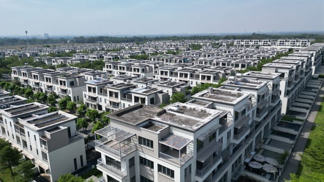 Explore a sprawling luxury housing complex in Dong Nai, Vietnam, captured in broad daylight.