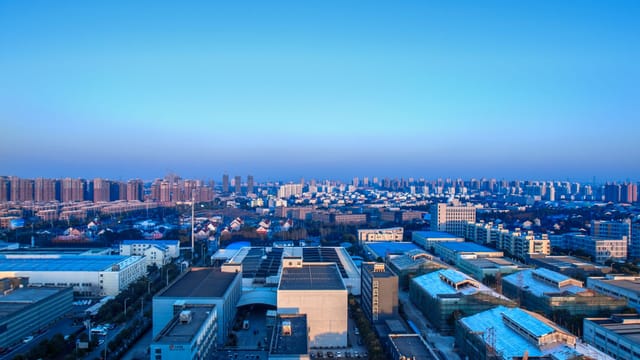 Stunning urban skyline of Shanghai, China at twilight, showcasing city architecture.