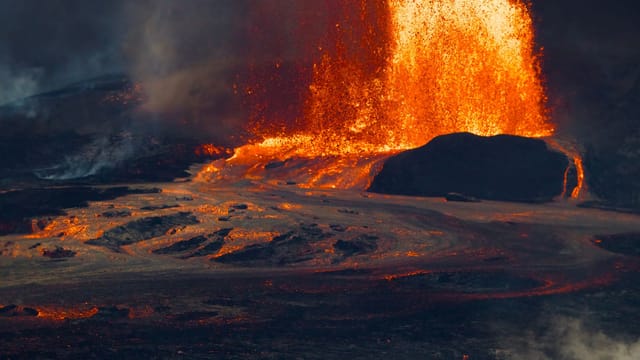 Dramatic volcanic eruption with lava at Hawaii Volcanoes National Park.