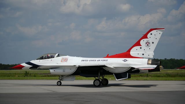 United States Air Force jet on tarmac in Charleston, SC, showcasing military aviation.