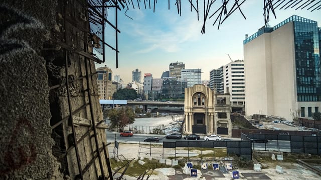 View of old downtown Beirut with damaged structures, highlighting urban decay.